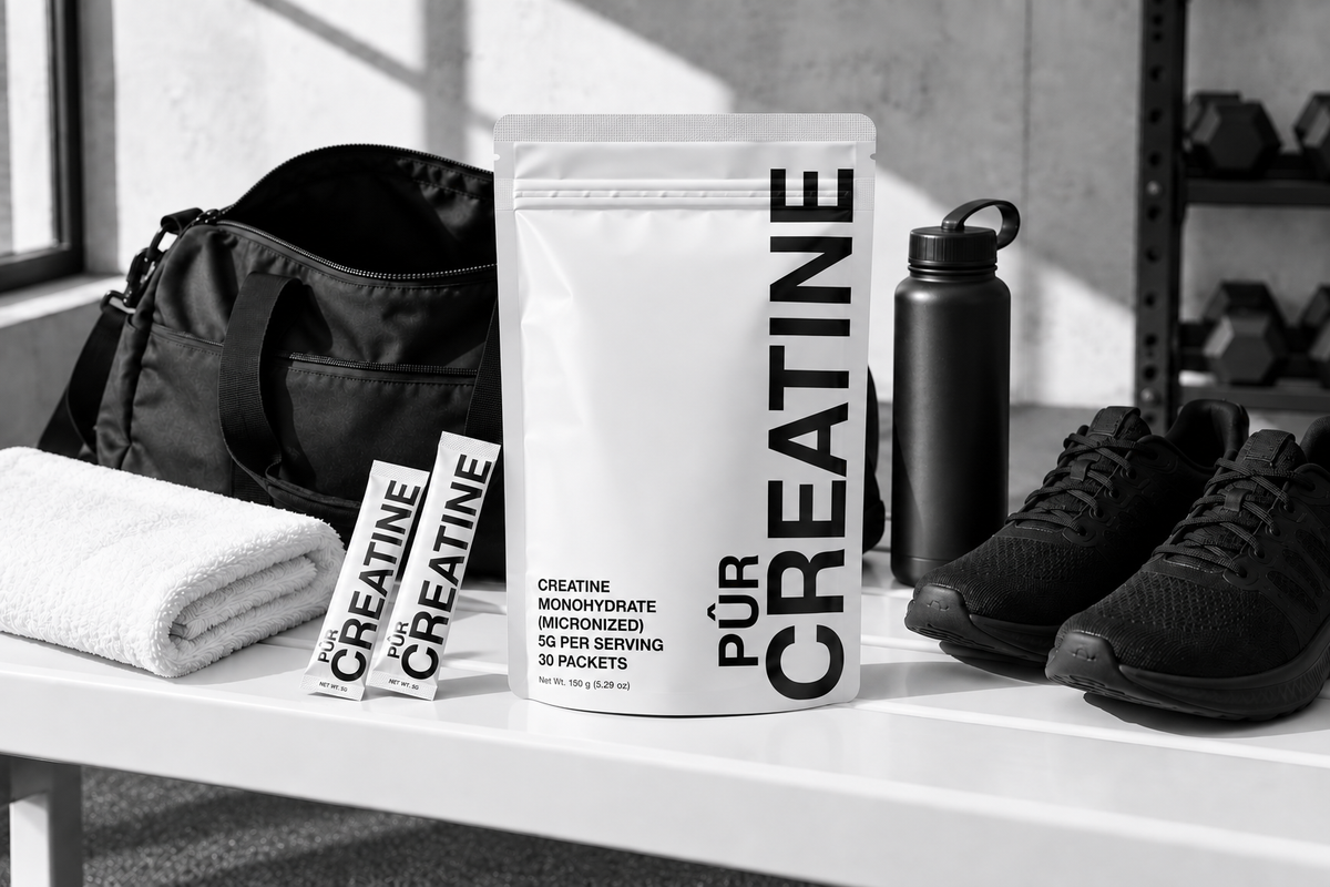 PÛR Creatine pouch and stick packets with gym bag and bottle